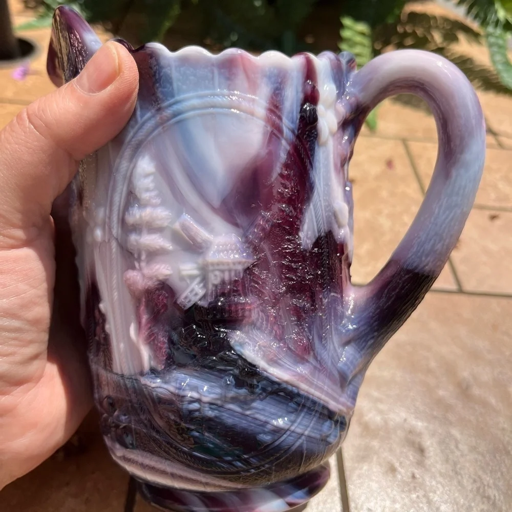 Vintage embossing windmill design glass pitcher